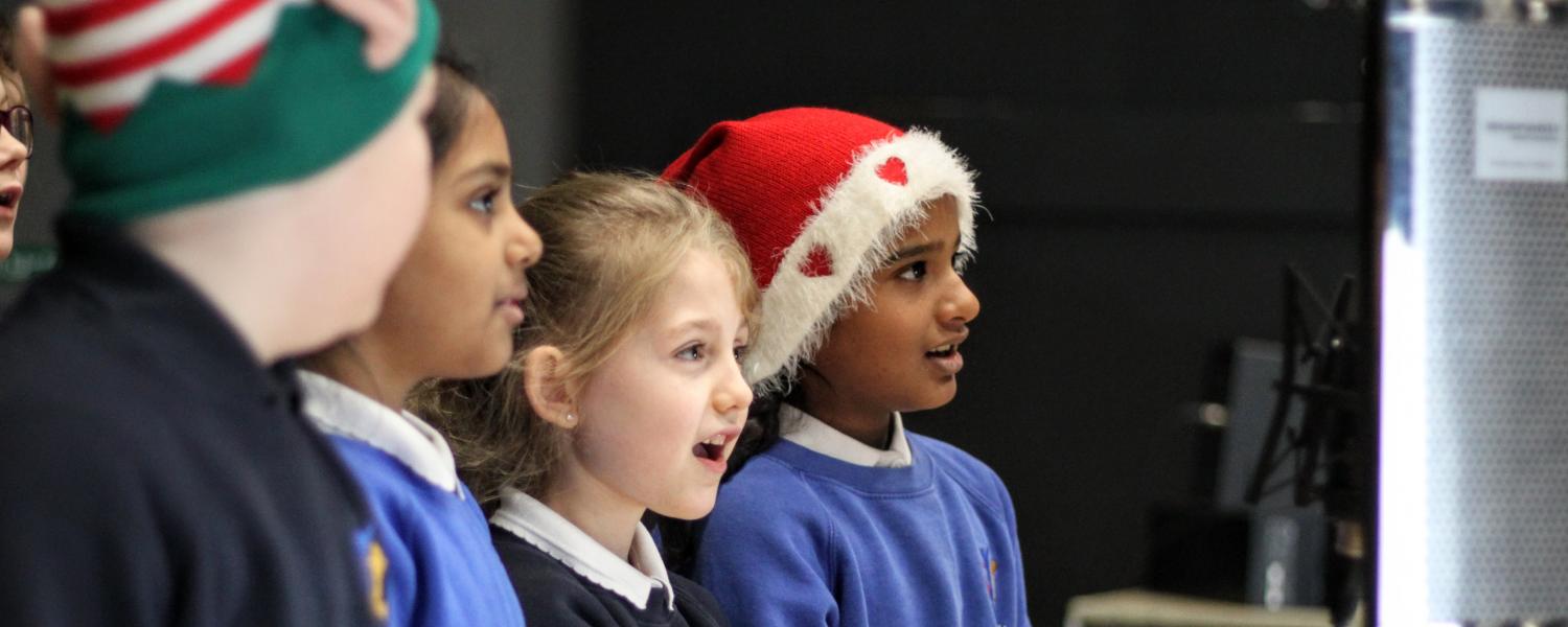 Students singing at Christmas